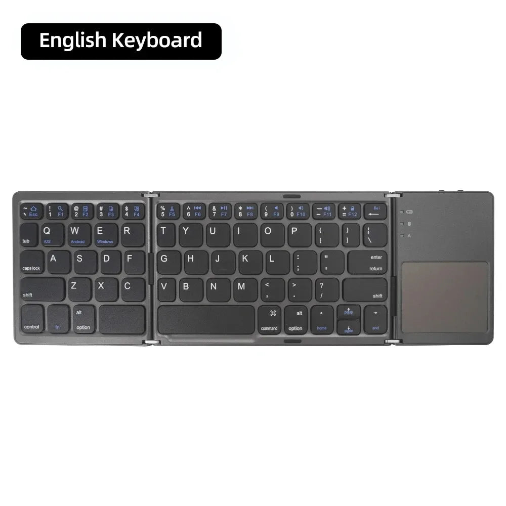 A premium foldable keyboard set up on a mobile desk for travel.