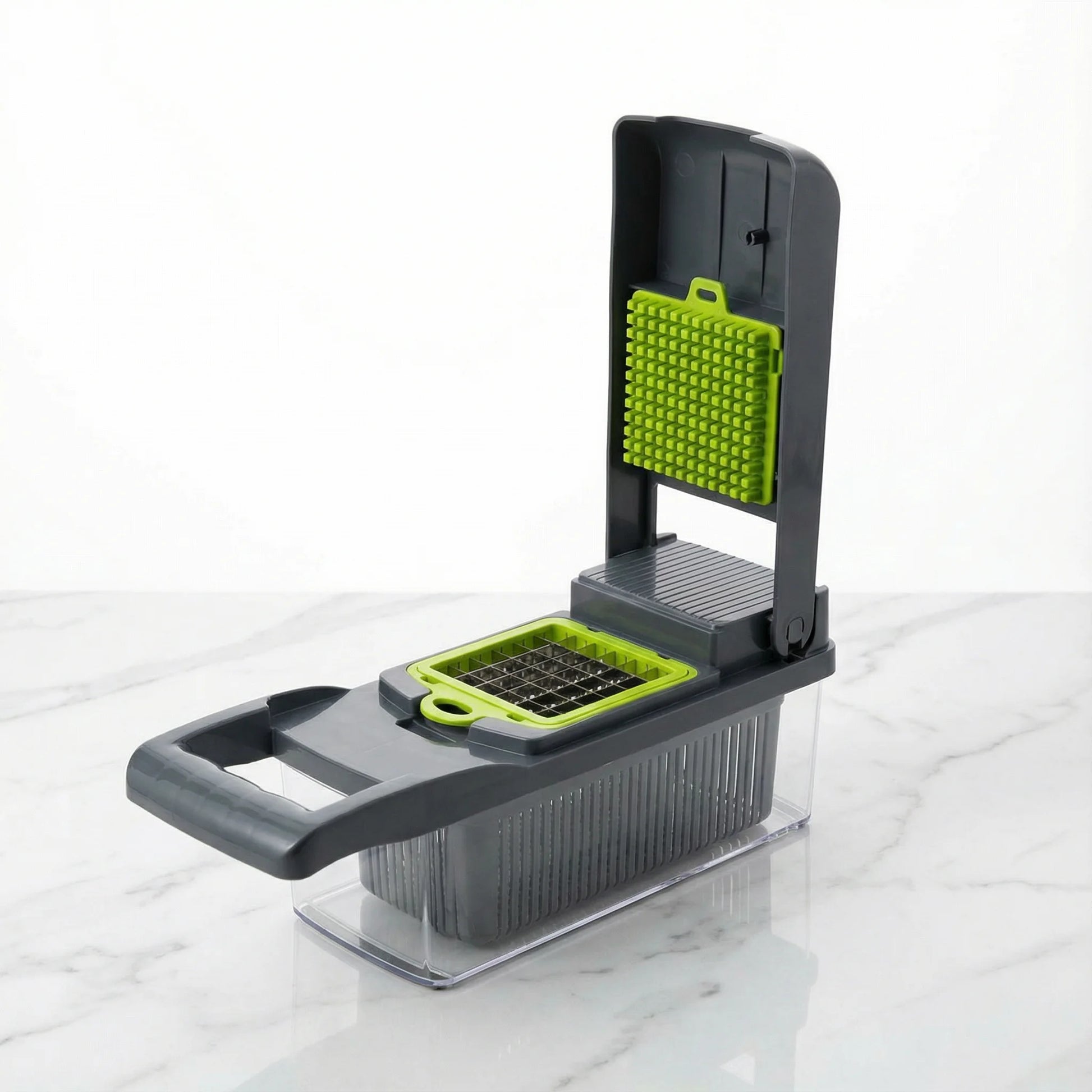 Manual vegetable chopper slicing fresh vegetables on a kitchen counter