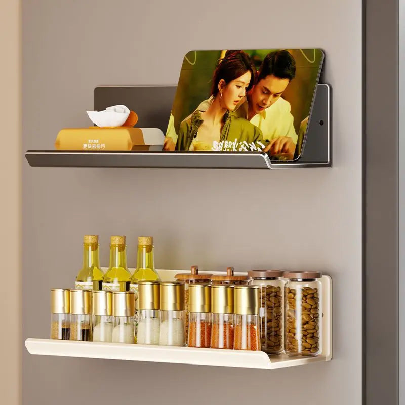 Magnetic shelf organizing kitchen essentials on refrigerator