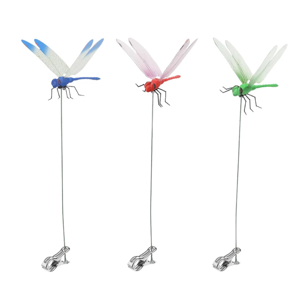 Detailed view of fake dragonfly clips on a summer hat