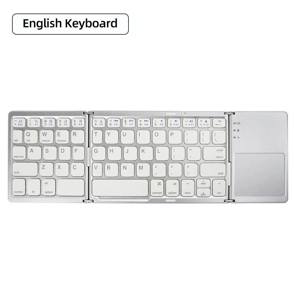 A premium foldable keyboard set up on a mobile desk for travel.