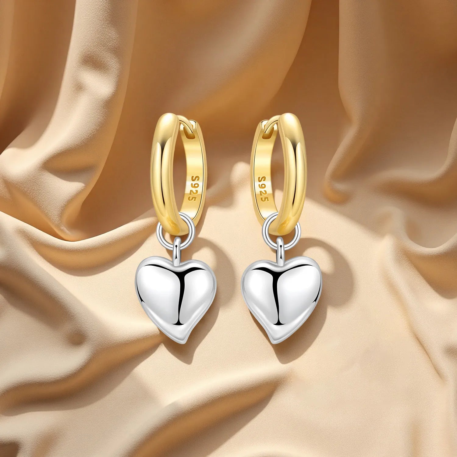 Elegant heart earrings for women featuring gold and silver heart-shaped designs, perfect for gifting and everyday fashion from VelmoraMart.