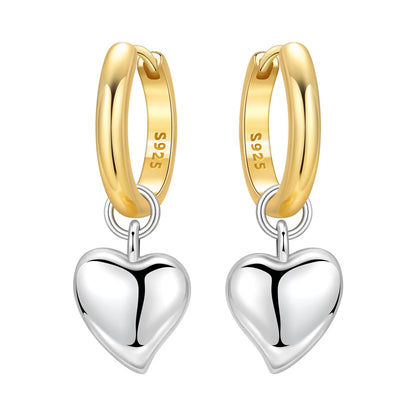 Elegant heart earrings for women featuring gold and silver heart-shaped designs, perfect for gifting and everyday fashion from VelmoraMart.