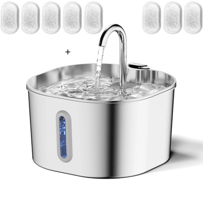 Stainless steel pet water fountain with water flowing out, surrounded by water filter cartridges.