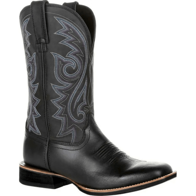 Black cowboy boot with intricate white embroidery on a white background
