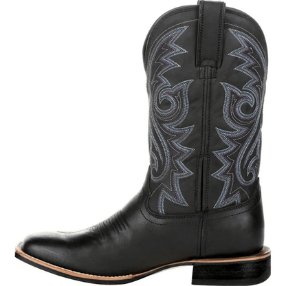 Black cowboy boot with intricate white stitching on a white background