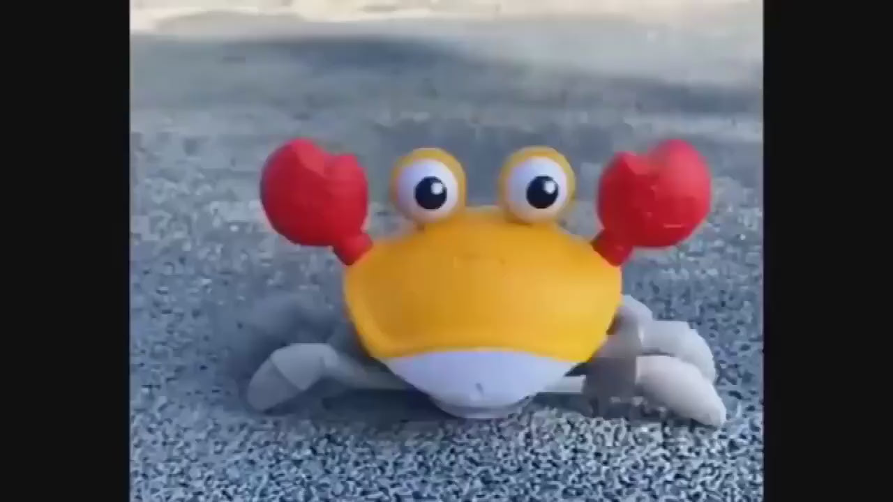 Interactive dancing crab toy for kids with music, crawling action, colorful lights, and obstacle avoidance from VelmoraMart
