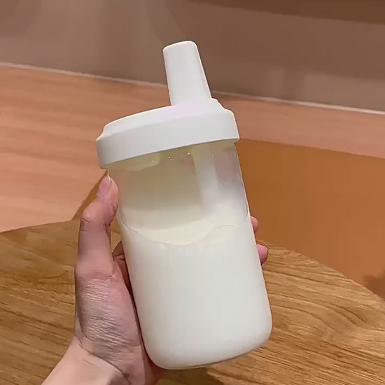 BPA-free sippy cup with straw and handles for toddlers and babies, leak-proof training cup for milk, water, and juice by VelmoraMart